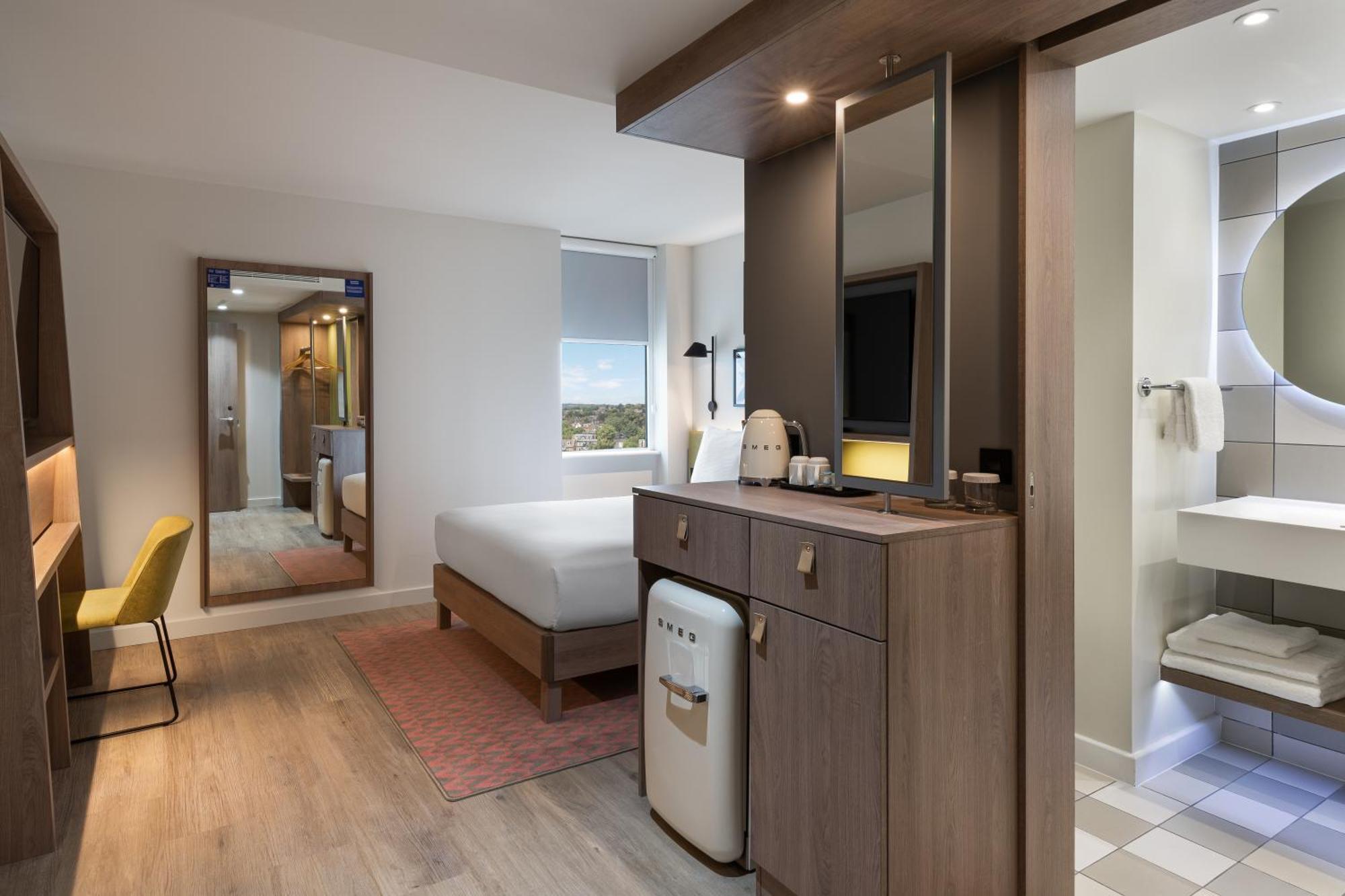 Quarto Queen com Sofá-cama